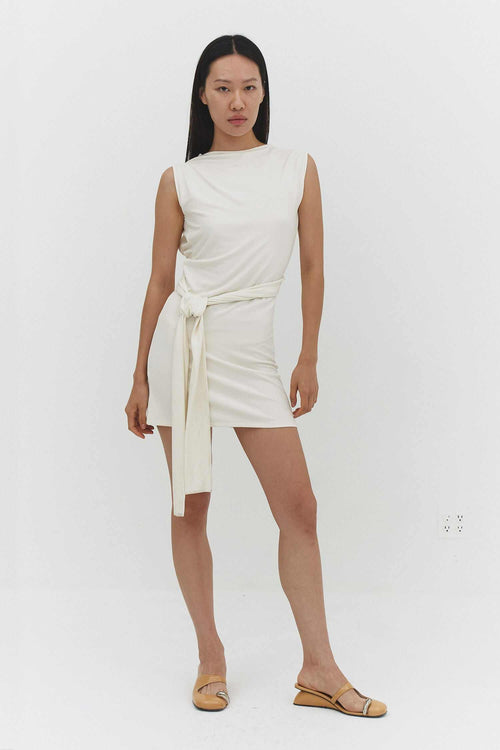 Beatriz DressRed's Casual  wearfindmenowthelabelMini DressBack at it. The Beatriz Dress is a mini dress with crisscross open back, side tie detail, and boat neckline. Effortlessly elevated.
Fit Details ✿✦  Fitted, stretchy✦BEATRIZ DRESS IN OFF WHITE